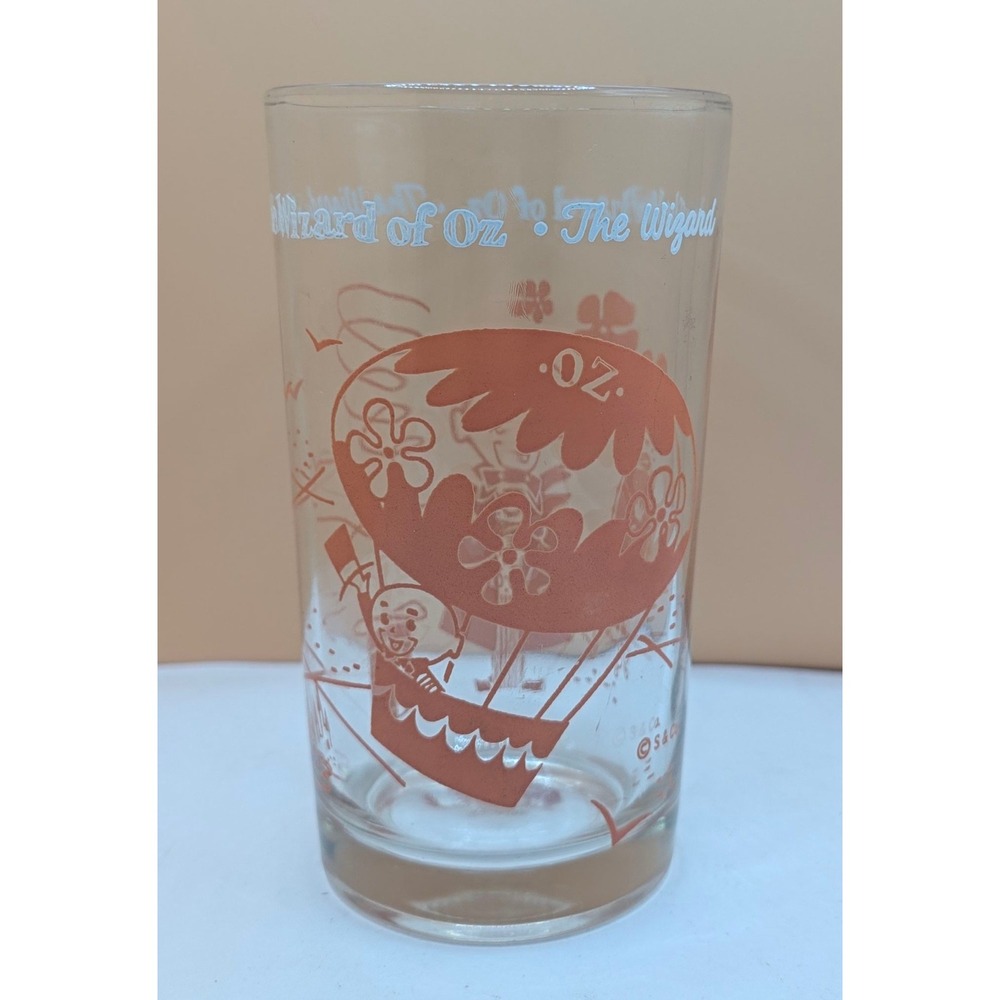 Vintage Wizard of Oz Hot Air Balloon Drinking Glass Orange Graphic Tumbler
